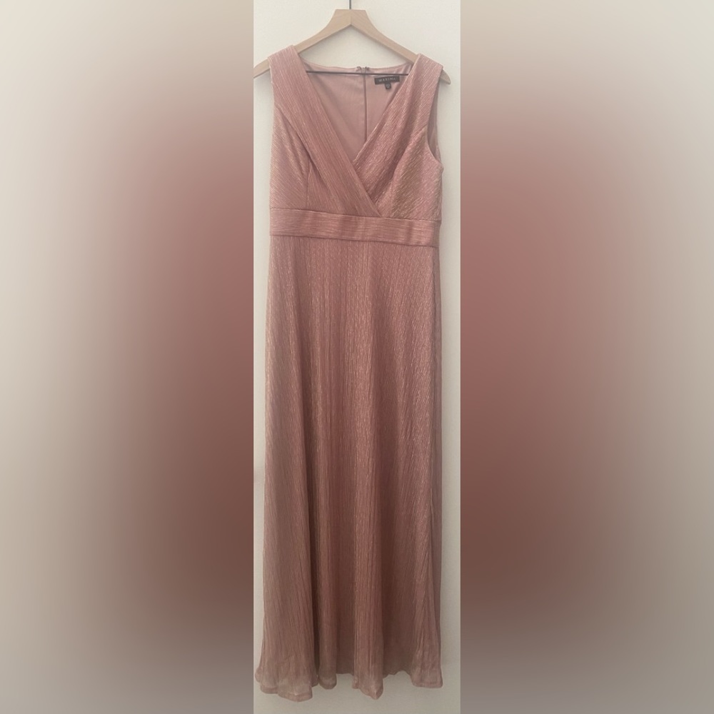 Beautiful Marina Gown. Hints of Metallic Gold & Mauve. Tags Removed Never worn.
